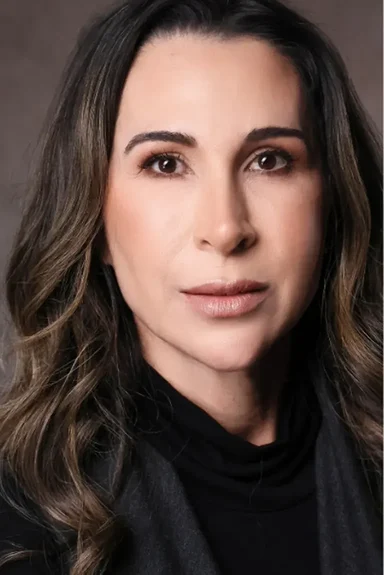 Dra. Carmen Calixto, cirurgiã-dentista responsável pela clínica.
